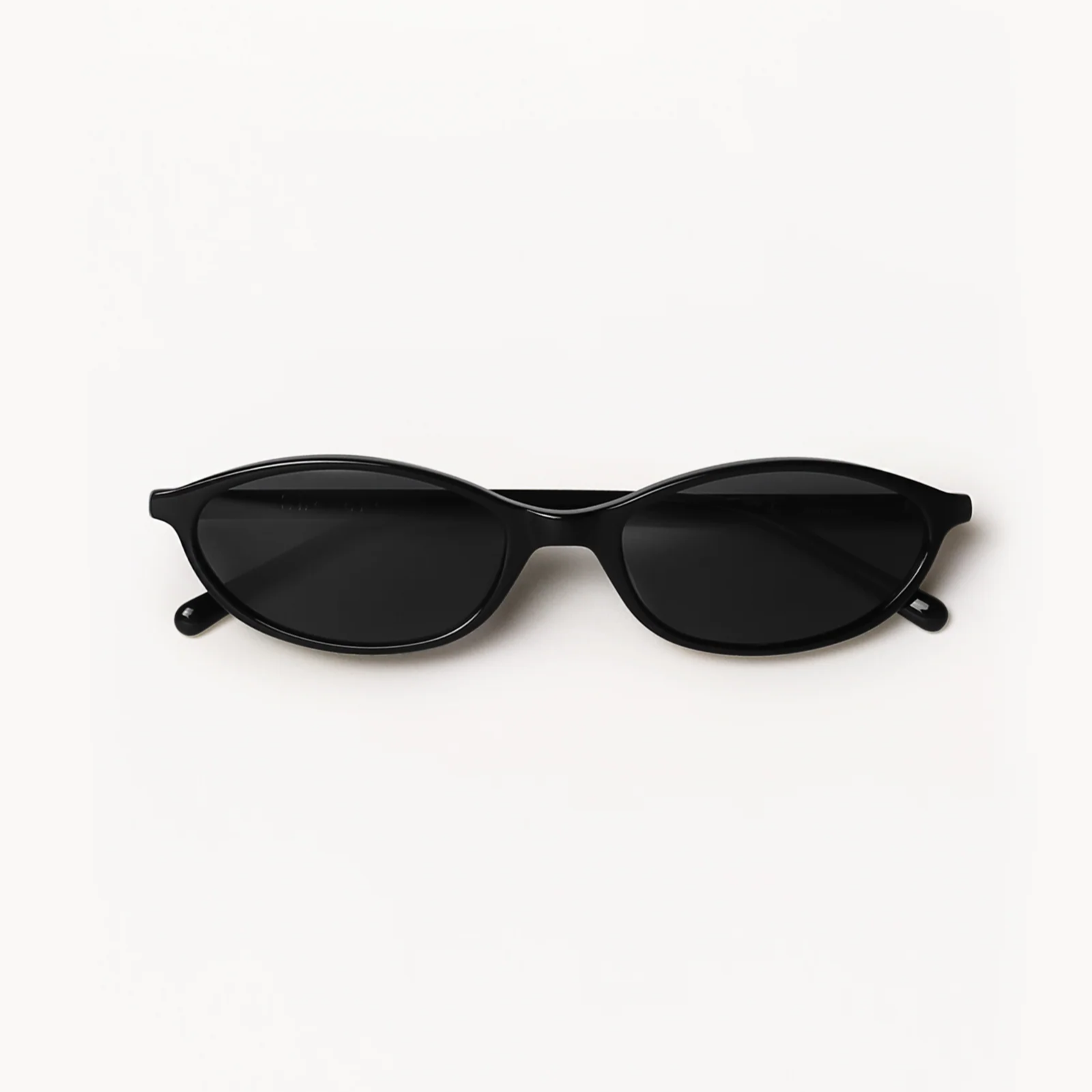 Black cat-eye sunglasses on a white background